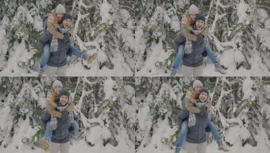 情侣在雪地玩雪高清在线视频素材下载