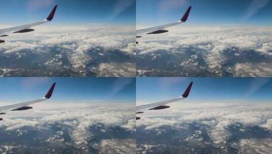 飞机窗口视角拍摄的美景高清在线视频素材下载