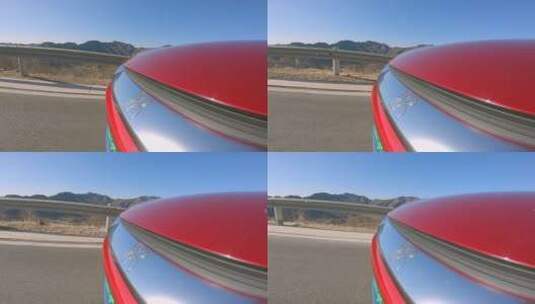 山路行驶的红色电动车头 特写 大山背景高清在线视频素材下载