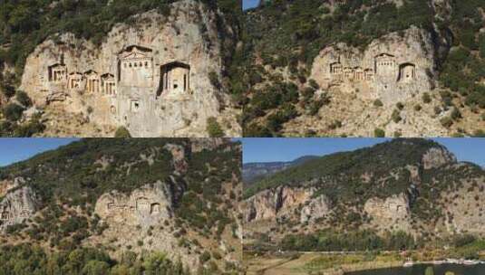 土耳其达利安岩石坟墓的鸟瞰图。无人机飞走了，露出了一个小村庄。皇家t高清在线视频素材下载