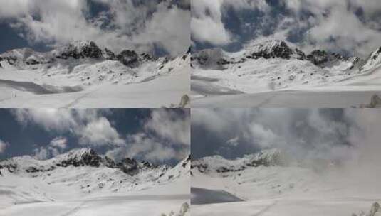 陆地冬季气候中的高海拔岩石雪尖山脊高清在线视频素材下载