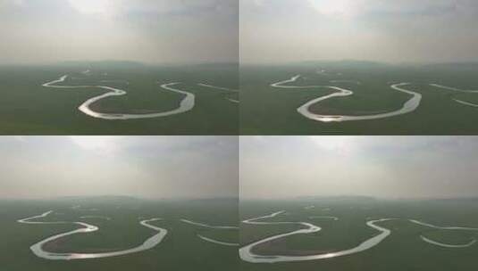 航拍烟雾蒙蒙的草原曲河莫尔格勒河高清在线视频素材下载