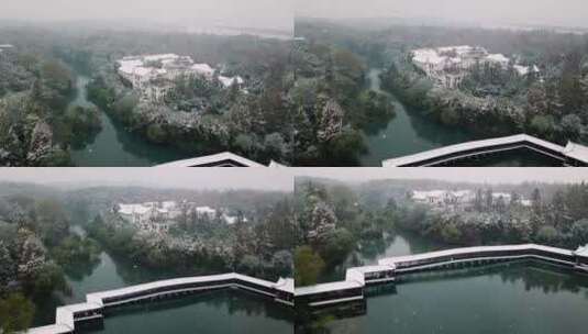 航拍杭州西湖景区浴鹄湾霁虹桥雪景高清在线视频素材下载
