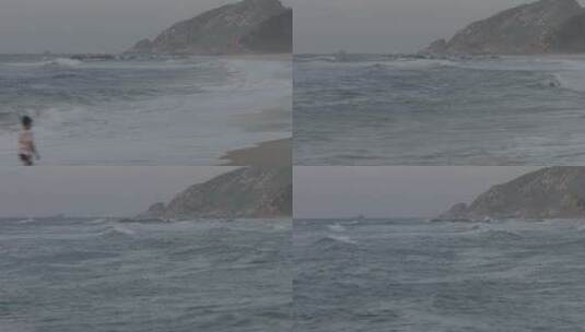 无人机航拍海边海浪拍打礁石沙滩海岸线浪花高清在线视频素材下载