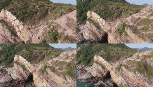 鹿嘴山庄无人机航拍海岸线海边礁石悬崖海浪高清在线视频素材下载