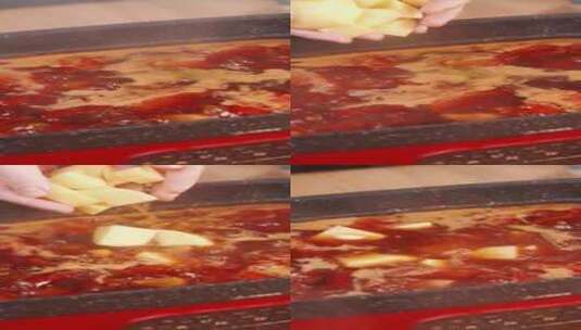 番茄土豆炖牛肉-14下入土豆块盖盖焖炖高清在线视频素材下载