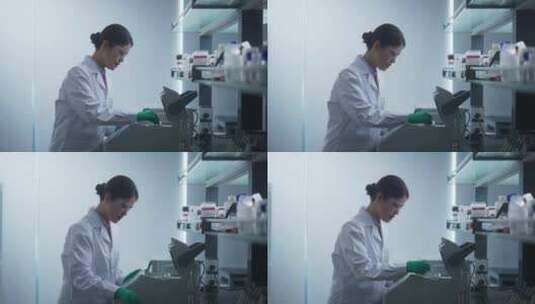 女性科学家在生化实验室做科研试验高清在线视频素材下载