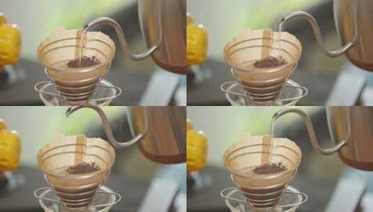 用咖啡壶手冲咖啡滤纸倒热水特写高清在线视频素材下载