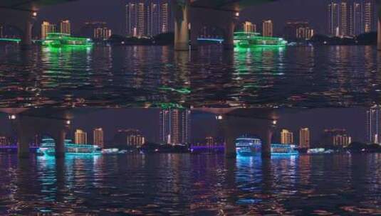 南宁邕江大桥下游船与城市滨江夜景灯光高清在线视频素材下载