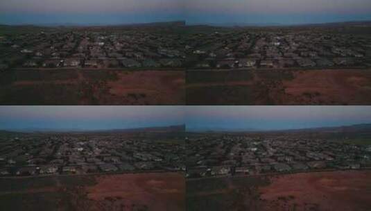 犹他州华盛顿县飓风城日落时分的住宅区。空高清在线视频素材下载