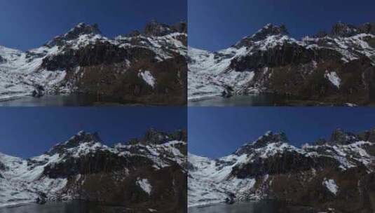 云南香格里拉南极洛雪山湖泊高空航拍高清在线视频素材下载