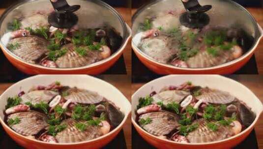 红烩海鲜焖煮海鲜西餐主厨制作扇贝大虾高清在线视频素材下载