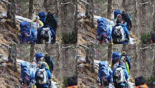 攀登岷山山脉雪宝顶雪山的登山队徒步进山高清在线视频素材下载