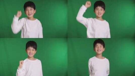 帅气的中国小男孩做手势加油打气8K实拍高清在线视频素材下载