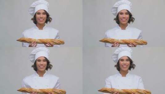 女厨师拿着面包的特写镜头高清在线视频素材下载