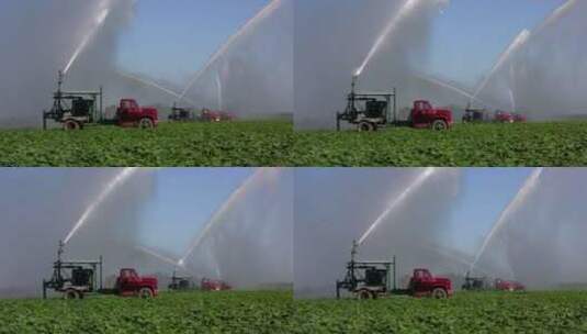 灌溉水田的卡车在喷水高清在线视频素材下载