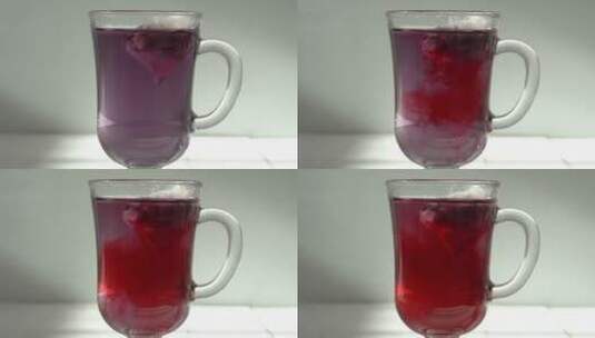 特写查看制作一杯热水果茶的快速视频片段。高清在线视频素材下载