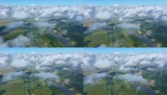 航拍云层下的五常村庄稻田高清在线视频素材下载