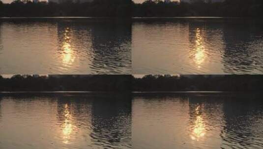 夕阳湖面泛起光晕高清在线视频素材下载