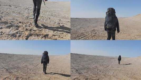 青海茫崖俄博梁雅丹徒步旅行的背包客高清在线视频素材下载