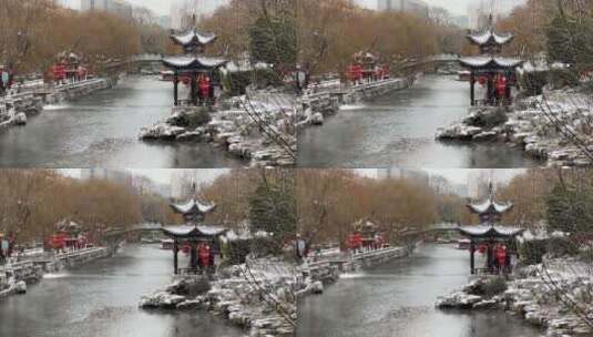 挂着红灯笼的济南护城河，雪后超美风景高清在线视频素材下载