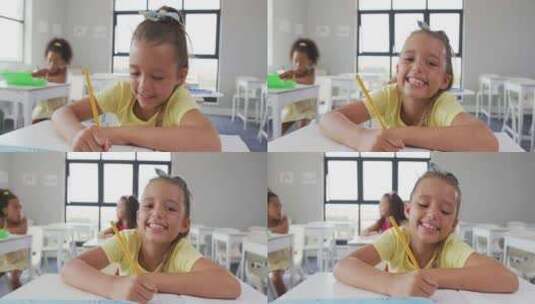 女孩坐在学校桌子前学习高清在线视频素材下载