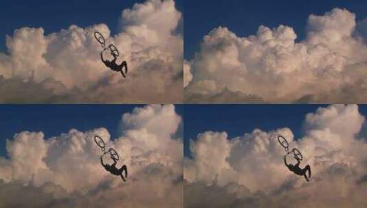 极限自行车运动在蓝天白云背景下高清在线视频素材下载