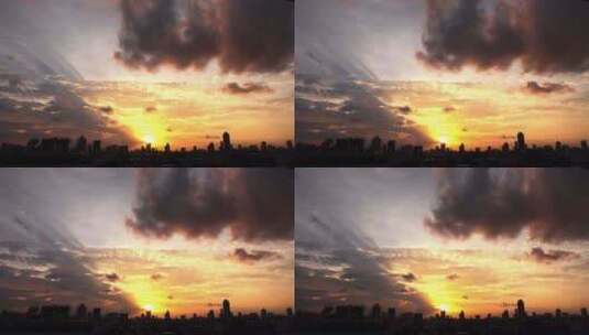 夕阳下城市天空的延时摄像高清在线视频素材下载