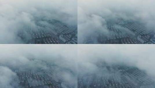 4K航拍平流雾下的上海城市建筑高清在线视频素材下载
