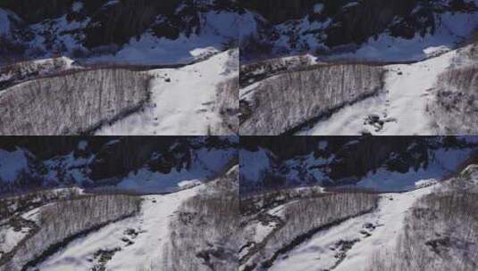 瑞士阿尔卑斯山冰川景观的航拍镜头，向后飞行高清在线视频素材下载
