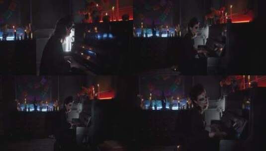 一个化着令人毛骨悚然的妆的女人在弹钢琴高清在线视频素材下载