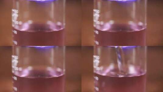 烧杯中花青素酸碱变色实验高清在线视频素材下载