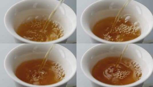 升格拍摄茶杯中冲倒祁门红茶普洱养生茶高清在线视频素材下载