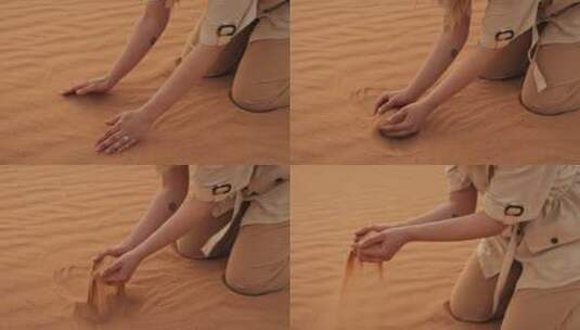 女人在沙漠中捧沙子高清在线视频素材下载