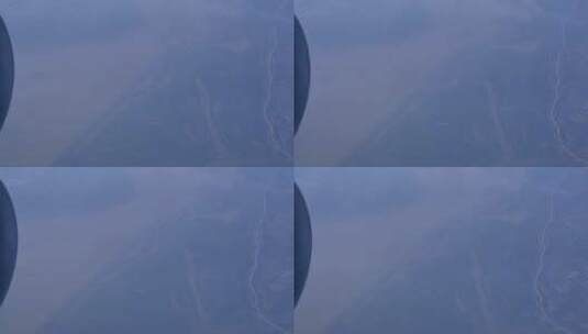 飞机舷窗外的云朵高清在线视频素材下载