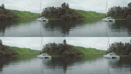 湖泊上漂浮的船只高清在线视频素材下载