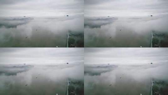 浓雾中的杭州滨江现代城市风光航拍高清在线视频素材下载
