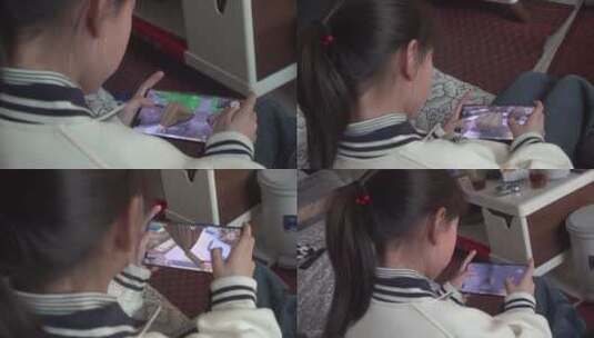 玩手机游戏的小女孩高清在线视频素材下载