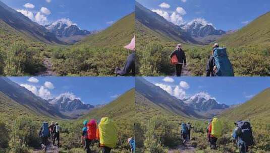四川甘孜攀登乌库楚雪山的登山者徒步行进中高清在线视频素材下载