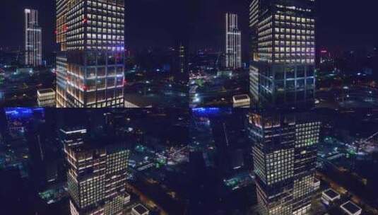 航拍广州城市夜晚写字楼建筑灯光高清在线视频素材下载
