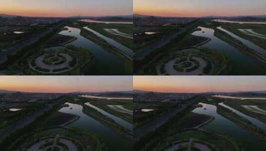 航拍宁夏石嘴山夕阳下的黄河湿地石嘴子公园高清在线视频素材下载