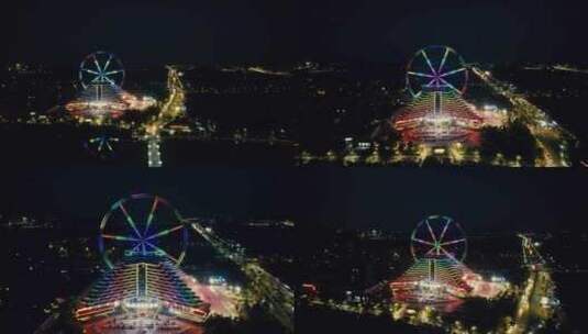聊城摩天轮地标建筑夜景航拍高清在线视频素材下载