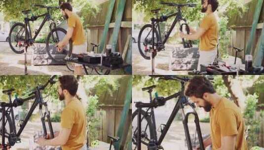 在外面调整自行车零件的人高清在线视频素材下载