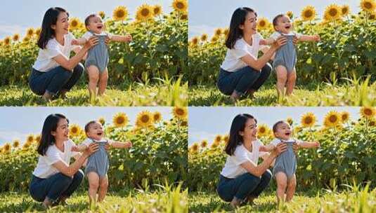 母亲带婴儿在向日葵田学步高清在线视频素材下载