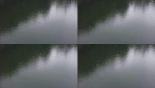 蓝色湖面阴雨绵绵雨滴实拍高清在线视频素材下载