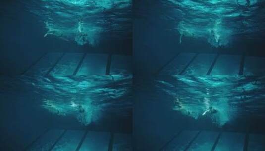 游泳者在游泳池游泳的慢动作高清在线视频素材下载