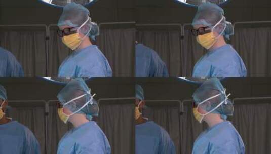 外科医生戴着手术口罩交流高清在线视频素材下载