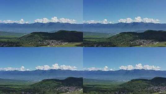 村庄后的高黎贡山山脉高清在线视频素材下载