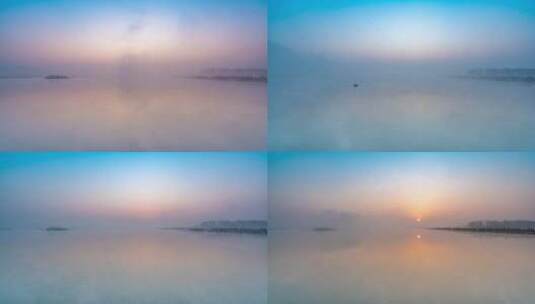 日出 平静的水面 晨雾缭绕高清在线视频素材下载