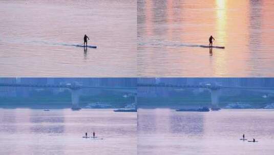 游滑艇在夕阳下高清在线视频素材下载